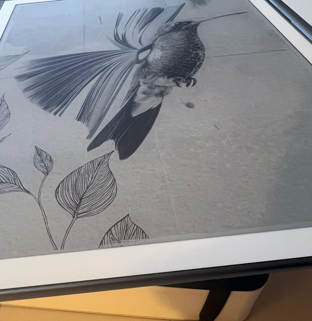 Scribe on top of a notebook